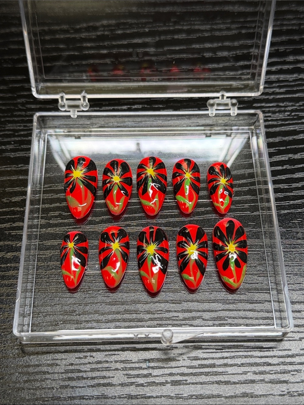 Red Floral False Nail Set with Black & Yellow Starburst Design